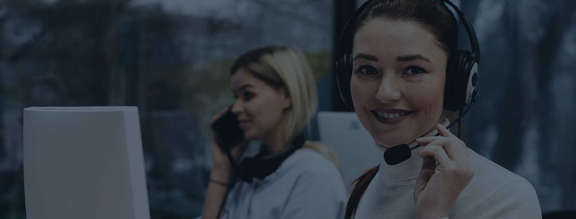 banner image of woman with headset looking and smiling